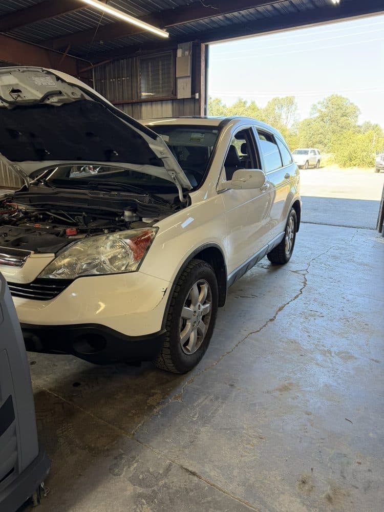 Honda CR-V with the hood open for engine diagnostics at NorCal Precision Auto in Redding, CA
