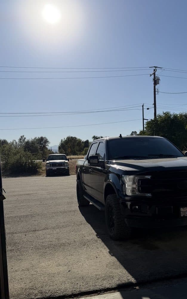 Lifted black Ford pickup outside the shop at NorCal Precision Auto in Redding, CA