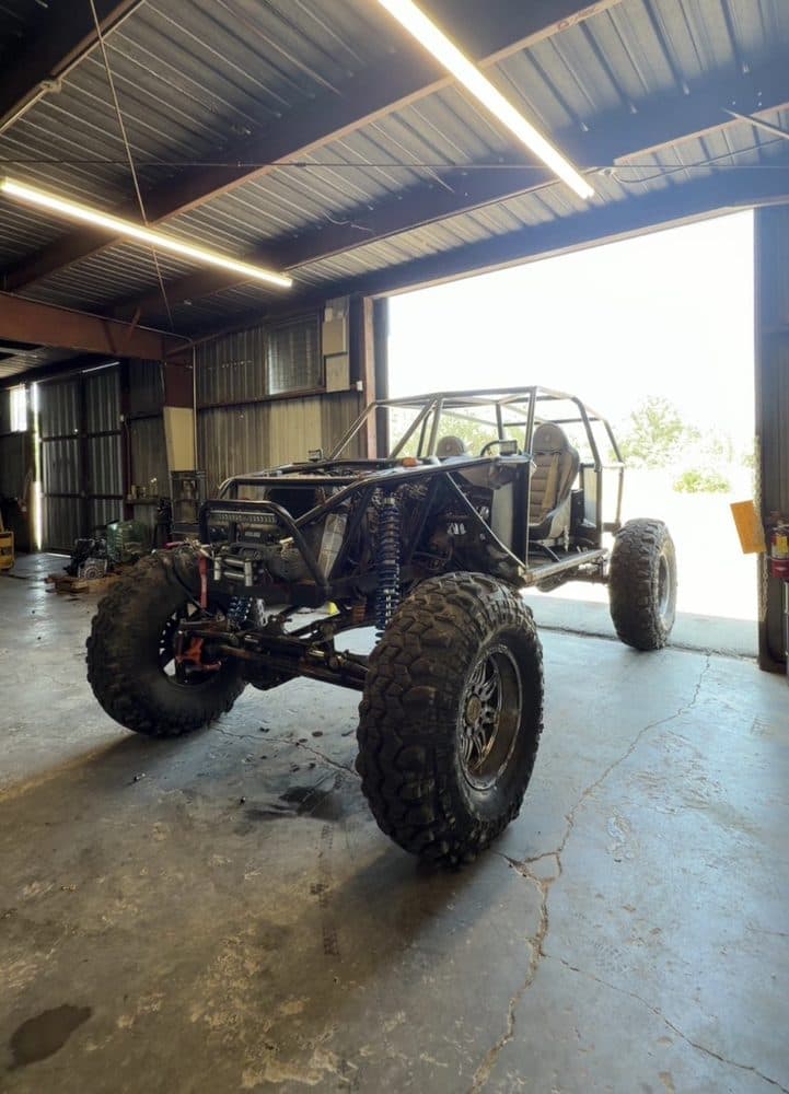 Tube-chassis off-road buggy in the shop for work at NorCal Precision Auto in Redding, CA