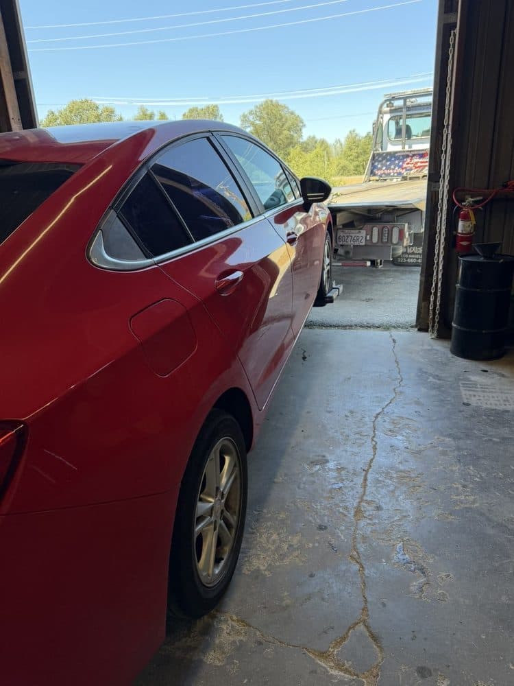 Red sedan pulled into the service bay at NorCal Precision Auto in Redding, CA